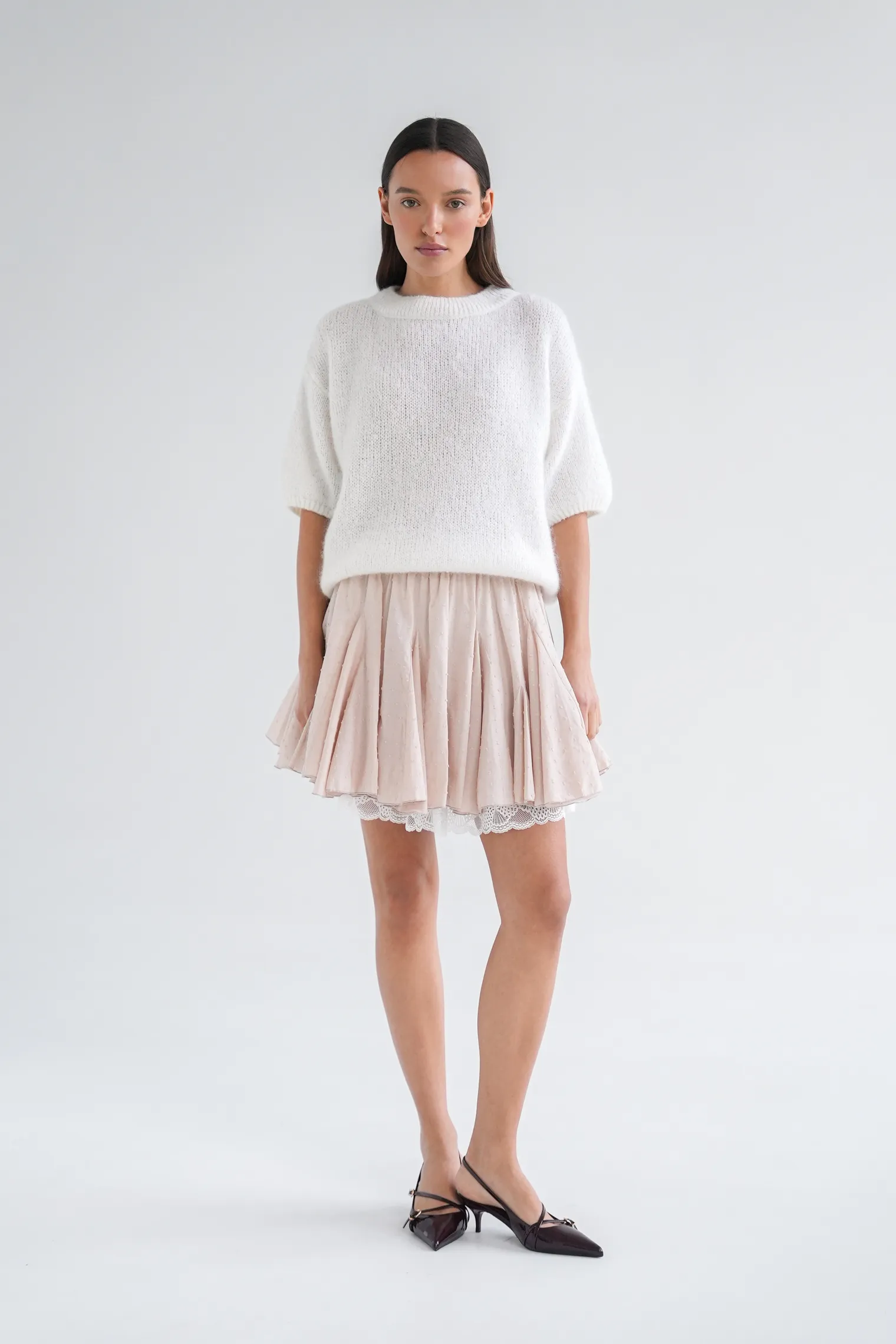 Юбка мини с клиньями бежевого цвета фото 8