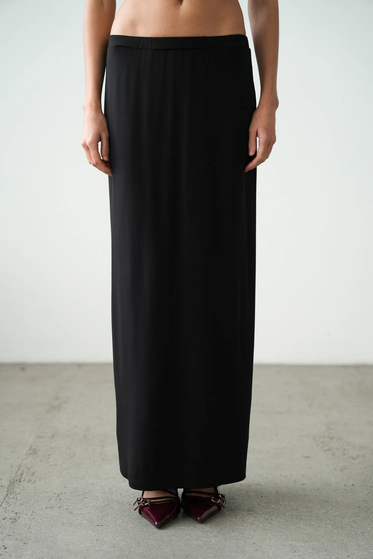 Юбка из тонкого трикотажа чёрного цвета фото 6